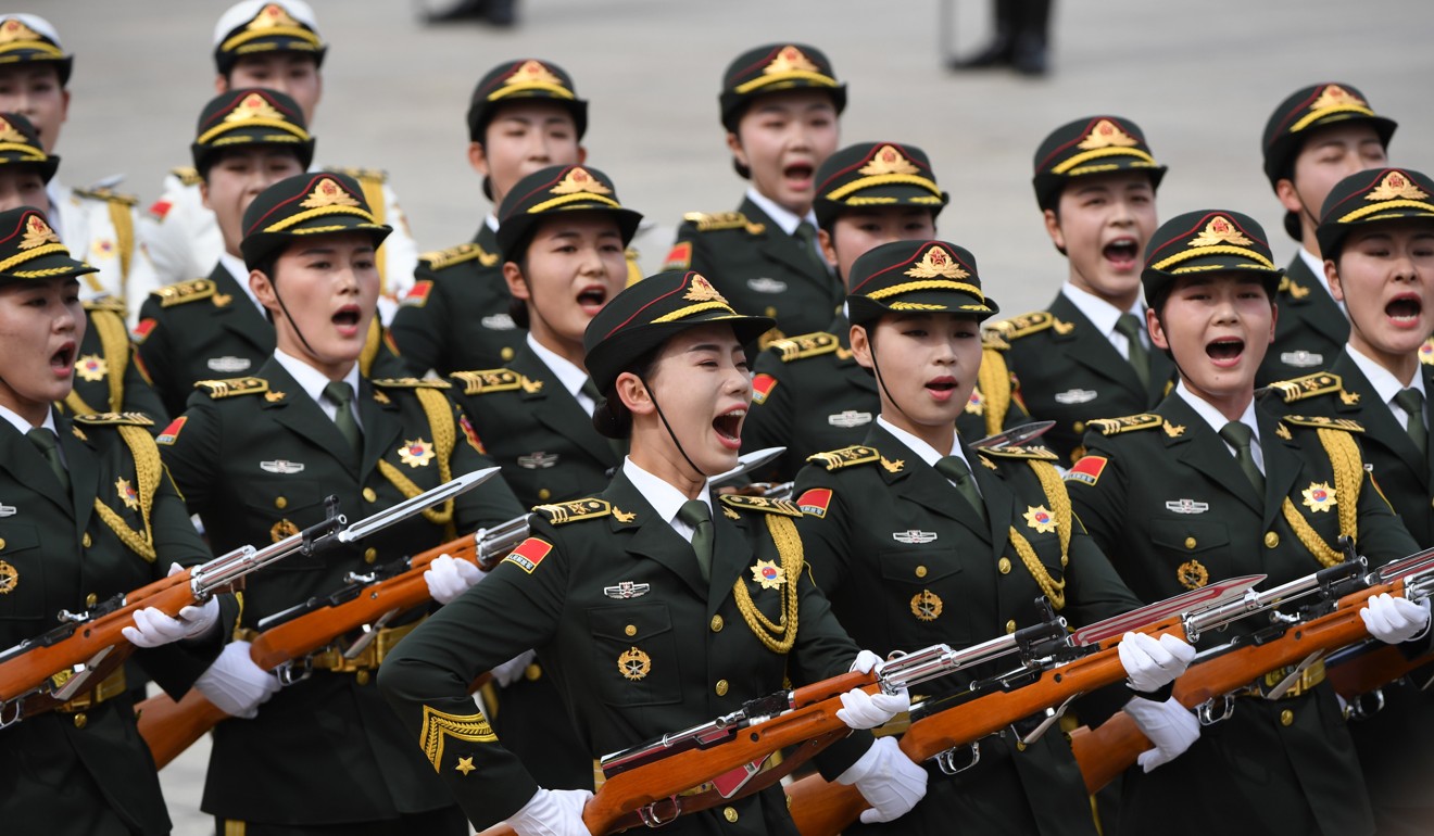 Members of a military honour guard march during a welcoming ceremony for Russia's President Vladimir Putin outside the Great Hall of the People in Beijing. Photo: EPA-EFE