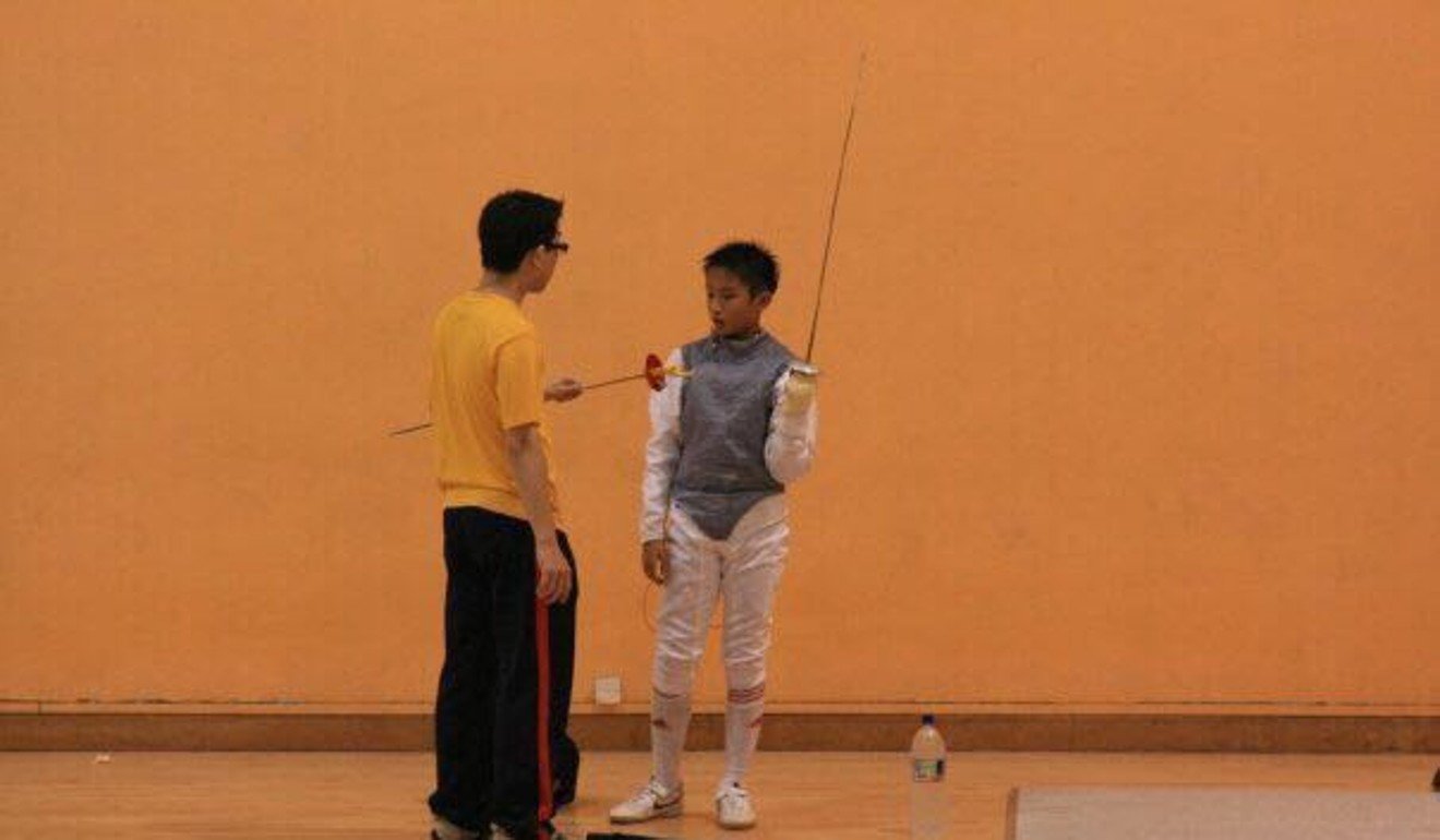Ryan Choi learns the art of fencing as a young boy. Photo: Handout