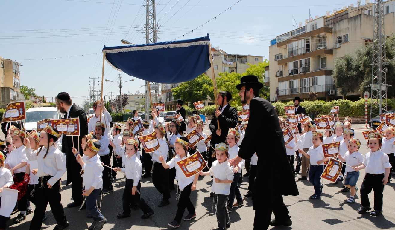 Ultra orthodox Jewish children march in Rehovot, Israel. Photo: Xinhua