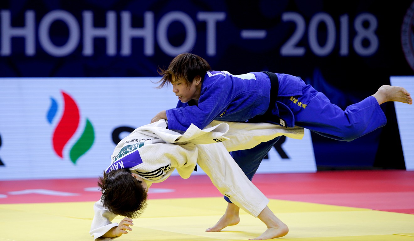 Ami Kondo (right) of Japan fights with Kang Yujeong of South Korea during the women’s 48-kilogram final at the 2018 IJF Judo Hohhot Grand Prix in Hohhot. Photo: Xinhua