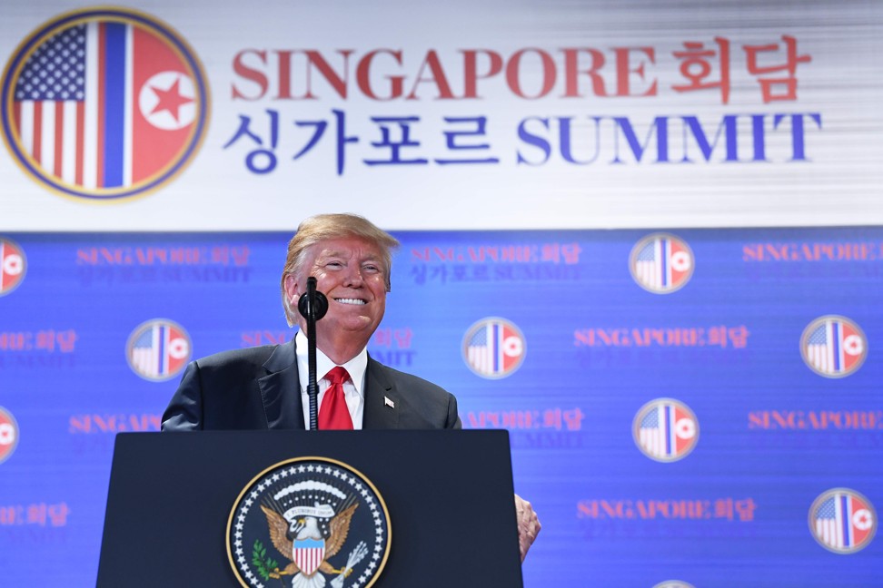 US President Donald Trump speaks at a press conference following the historic US-North Korea summit in Singapore on Tuesday. Photo: AFP