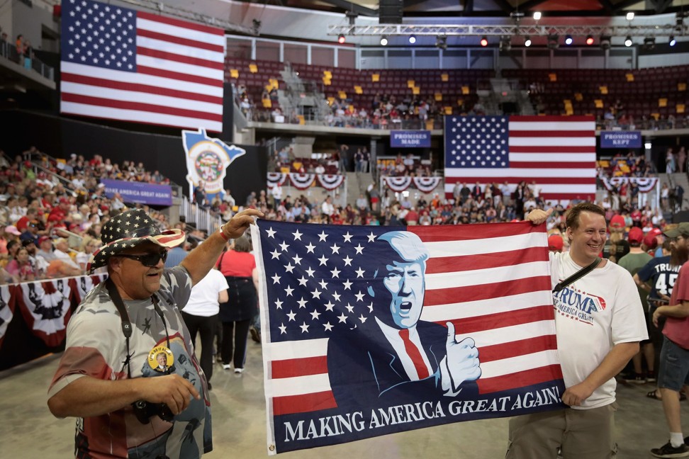 Supporters wait for the start of a campaign rally with President Donald Trump at the Amsoil Arena in Duluth, Minnesota. Photo: AFP