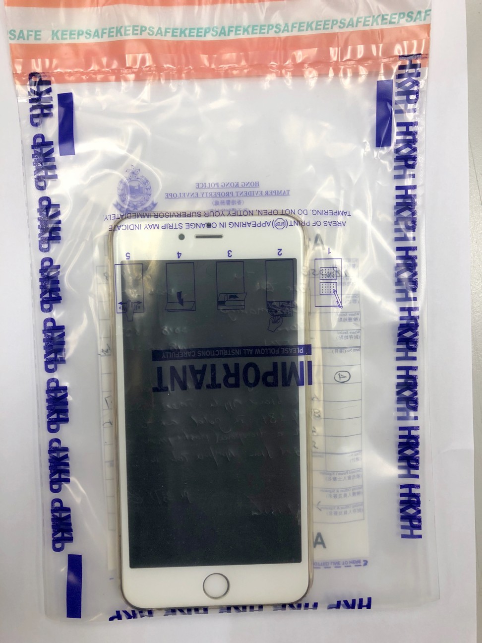 In the raid in Tsuen Wan, police found HK$1.9 million in illegal soccer betting records stored in a mobile phone. Photo: Handout