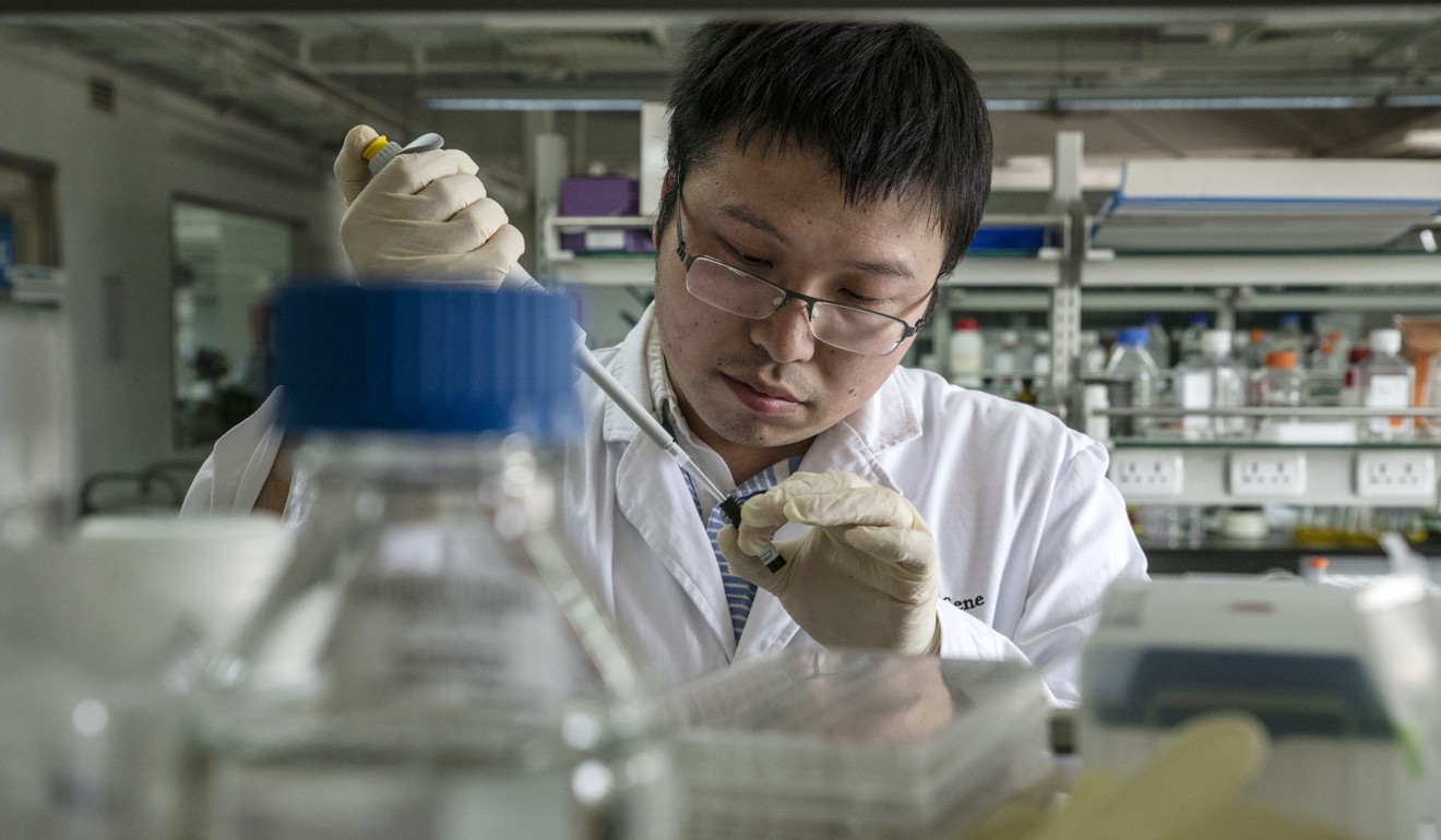 A researcher prepares a sample inside a laboratory at BeiGene Ltd’s research and development centre in Beijing. China is expected to surpass the US as the world’s largest investor in research and development next year. Photo: Bloomberg