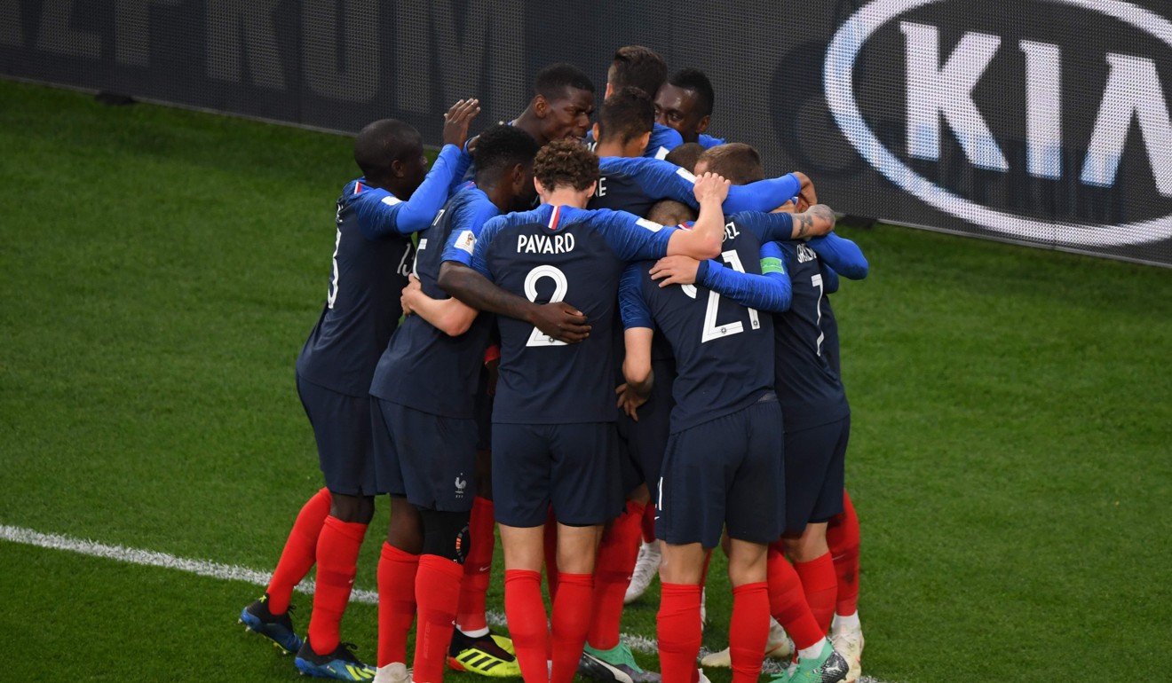 France players celebrate their opening goal during the World Cup group C win over Peru. Photo: AFP