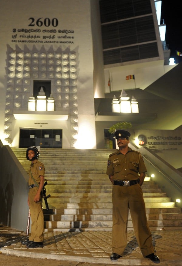 Sri Lankan police guard the headquarters of the Bodu Bala Sena after dispersing activists demonstrating against religious extremism and hate speeches. Photo: AFP