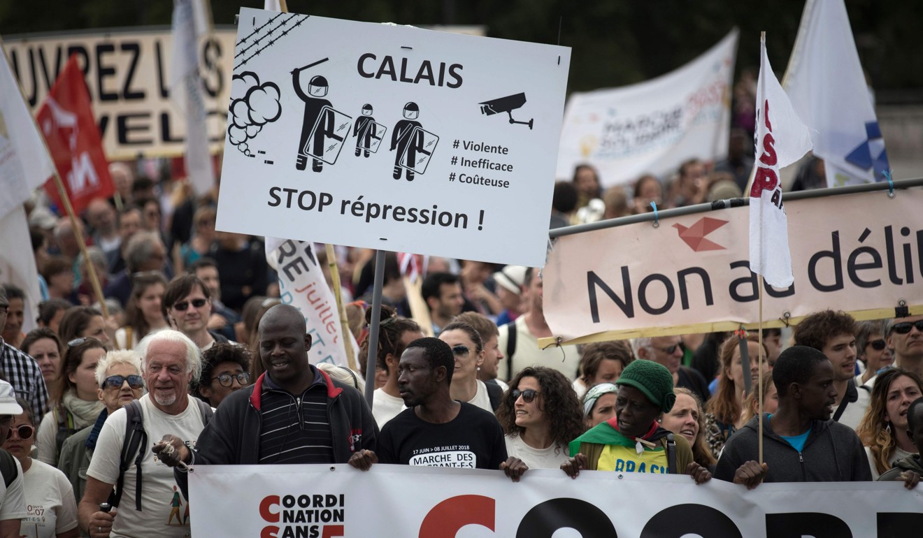 Demonstrators take part in the Citizen and Solidarity March from Place de la Bastille to Place de la Republique in Paris on June 17, 2018, in support of migrants and refugees. Photo: AFP