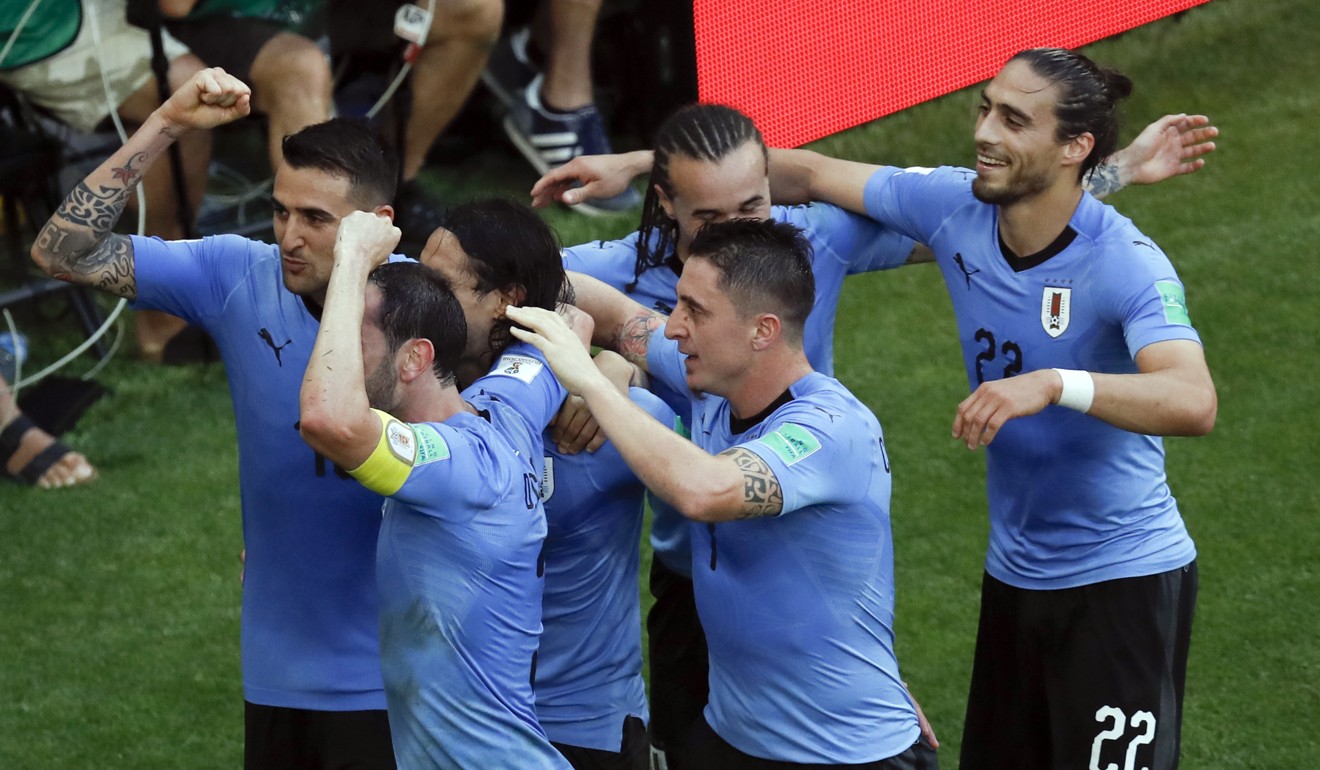 Uruguay gave Russia a reality check in their final group A match. Photo: AP