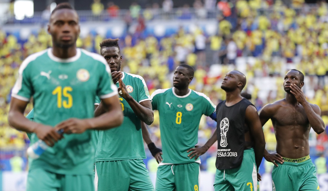 Senegal players leave the field distraught as they are eliminated from the 2018 World Cup. Photo: AP
