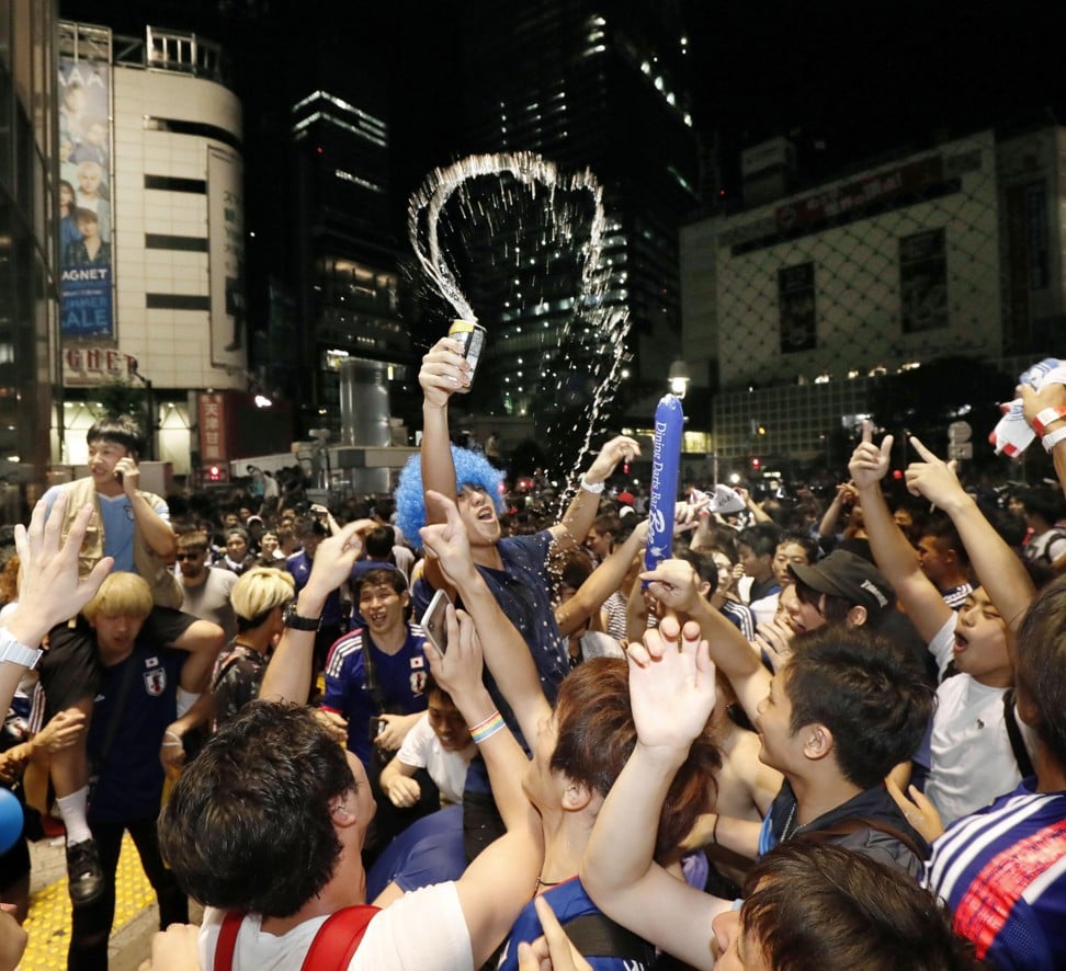 Japanese fans celebrate in Shibuya. Photo: Kyodo