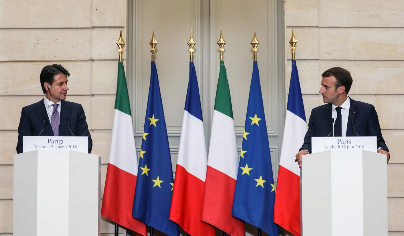 Italian Premier Giuseppe Conte (left) and French President Emmanuel Macron hold a joint press conference following their meeting at the Elysee Palace in Paris on June 15, after a bitter diplomatic spat between France and Italy over the new Italian government's refusal to give a rescue ship, carrying 629 migrants, permission to dock. Macron accused Italy of acting “irresponsibly” by refusing to accept the ship, while Conte countered that France was being hypocritical. Photo: EPA-EFE