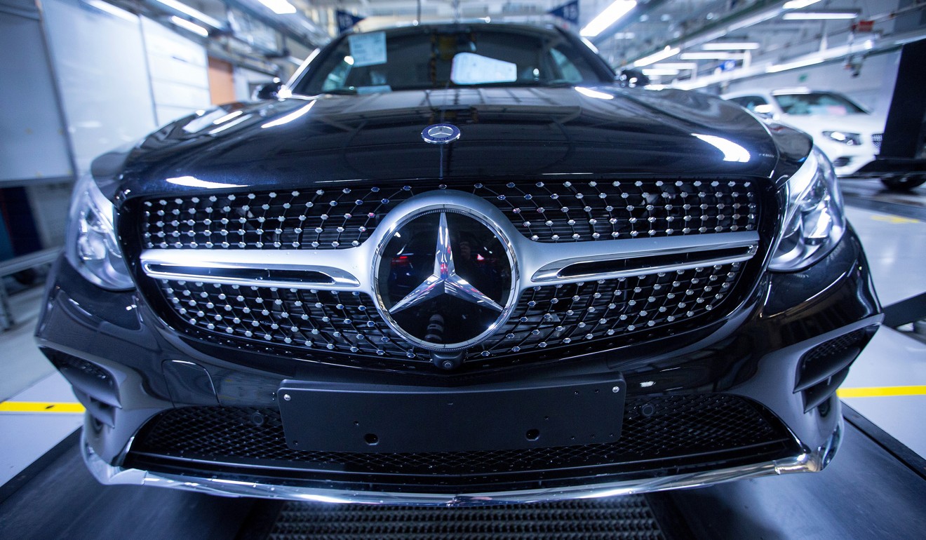 A badge sits on a Mercedes-Benz GLC car at the luxury automaker's factory in Bremen, Germany, in 2017. Photo: Bloomberg