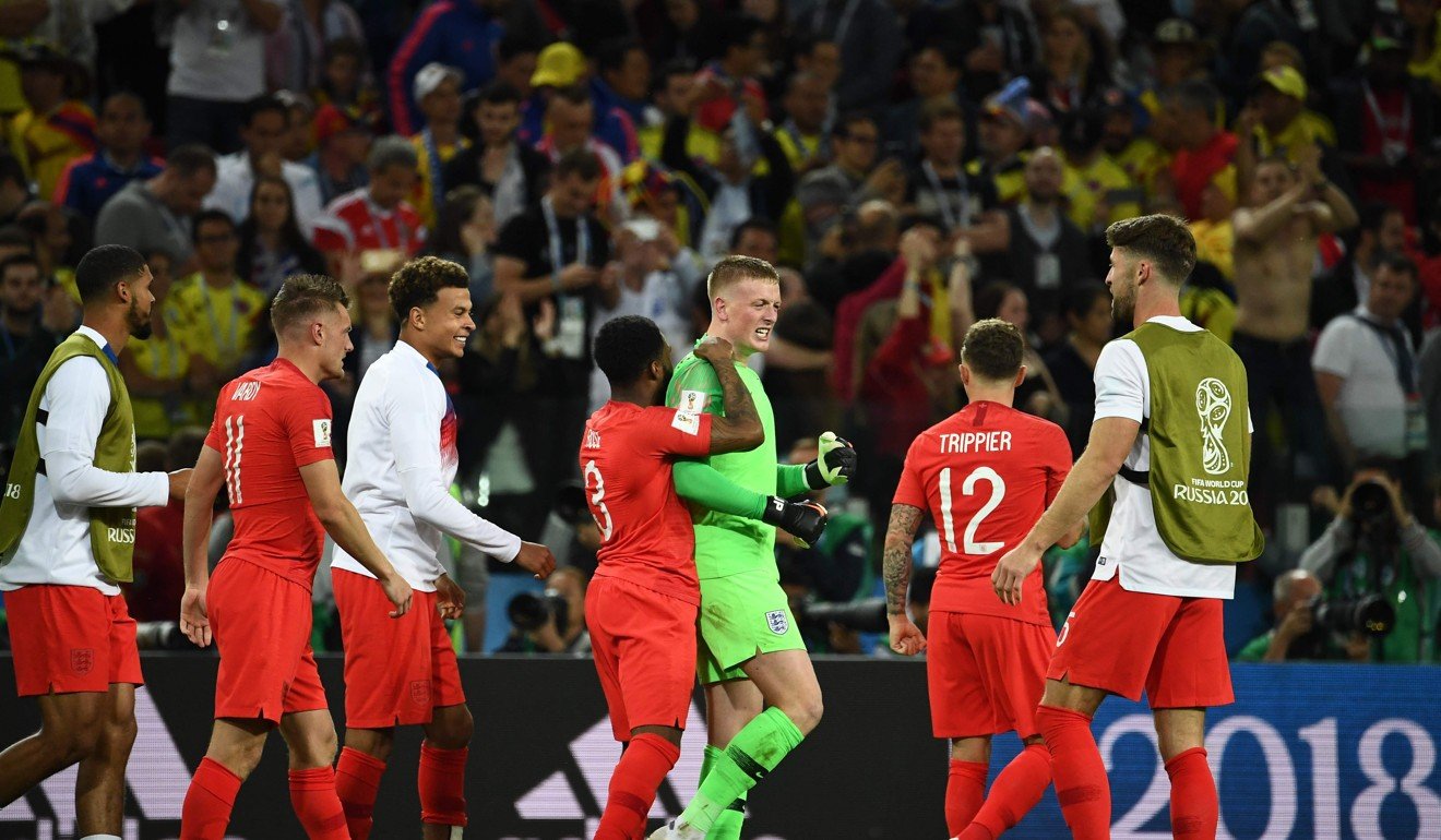 England's goalkeeper Jordan Pickford celebrates after winning. Photo: AFP