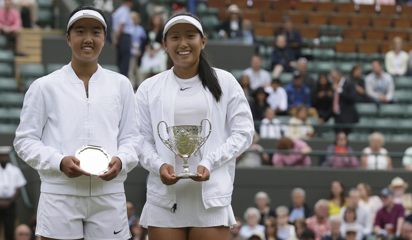 Claire Liu (right) and Ann Li at the presentation after the girls’ singles final at Wimbledon. Photo: AP