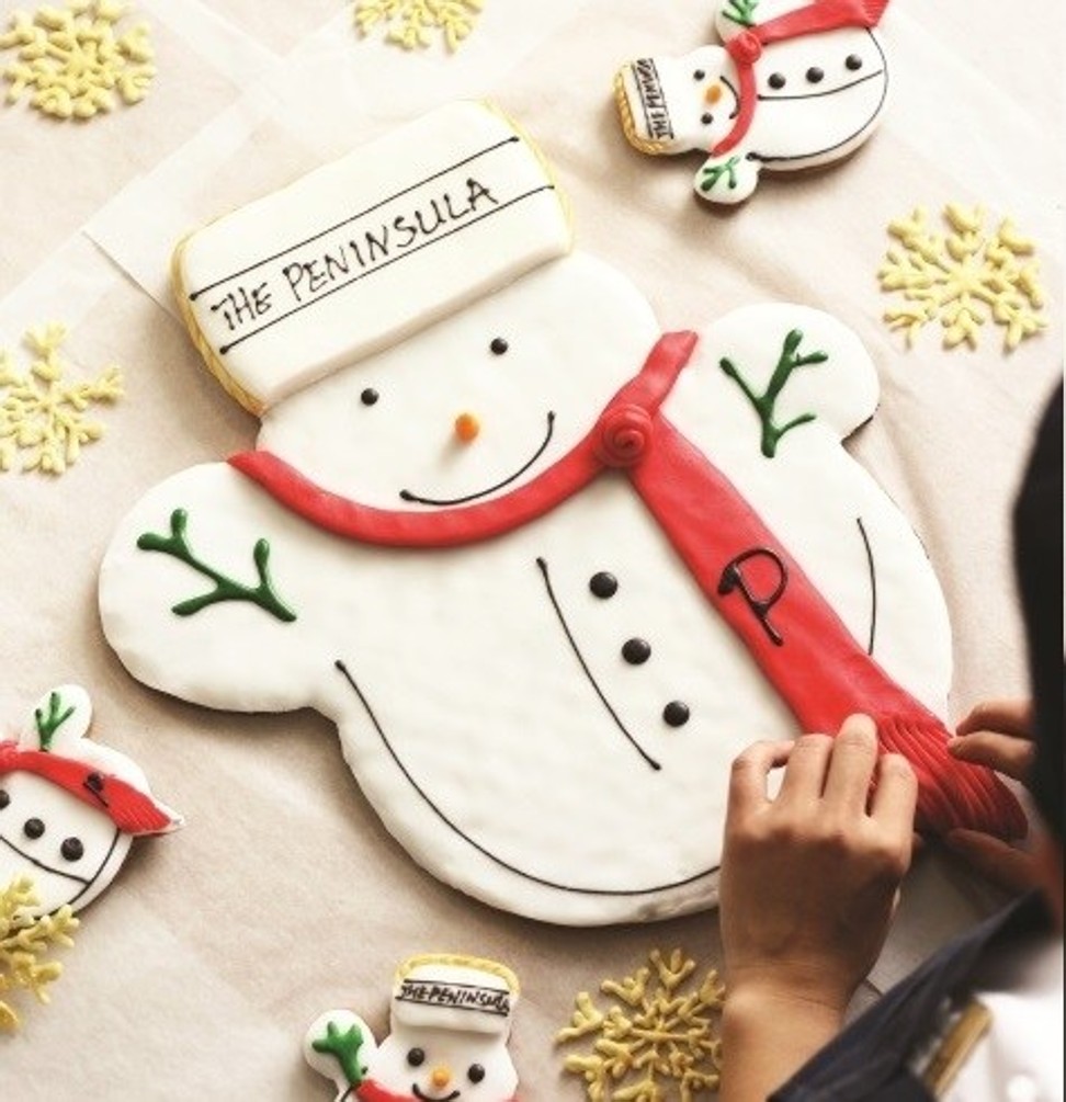 The Peninsula hotel in Beijing has been offering parents the chance to bake biscuits and decorate trees with their children as a way to entice families over Christmas. Photo: China Lux