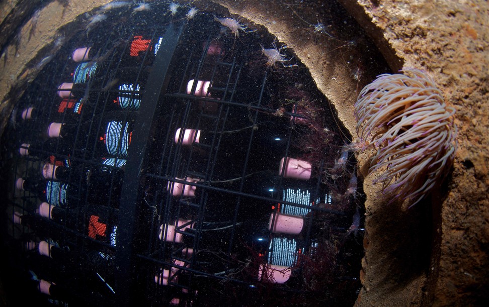Bottles of wine sit on the seabed in an underwater cellar in Plentzia bay, Spain. Photo: AFP