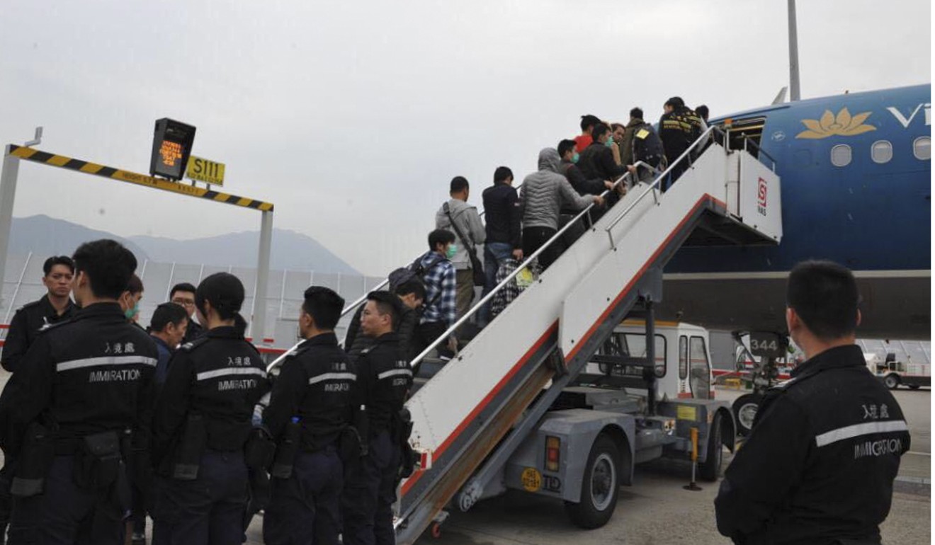 Sixty-eight unsuccessful asylum applicants board a chartered flight back to Vietnam in December. Photo: Handout
