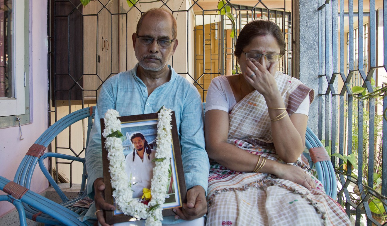 Gopal Chandra Das, left, and Radhika Das are the parents of Nilotpal Das, who was killed in a mob attack in Gauhati, India. Photo: AP