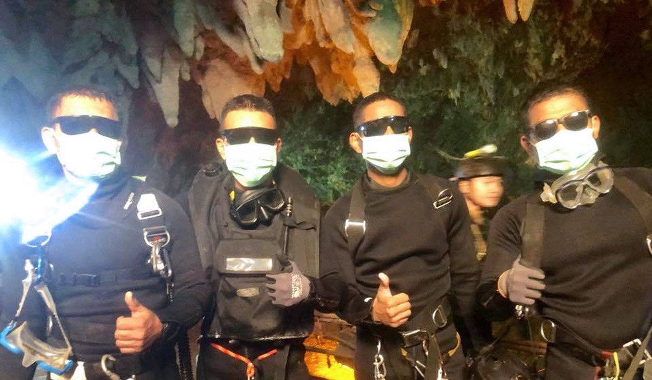 The last four Thai Navy Seals give a thumbs up after exiting safely from the Tham Luang cave. PhotoL AFP