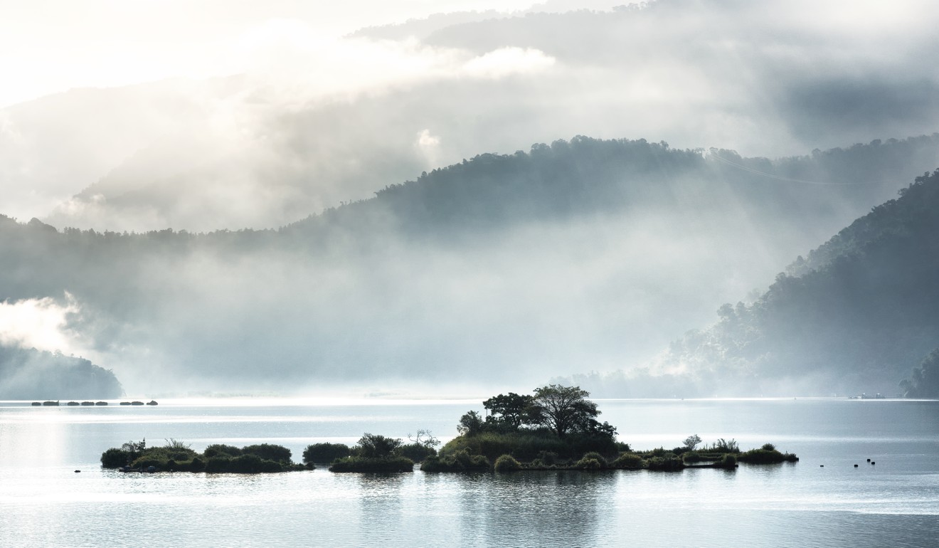 A painterly sunrise over Taiwan's Sun Moon Lake.