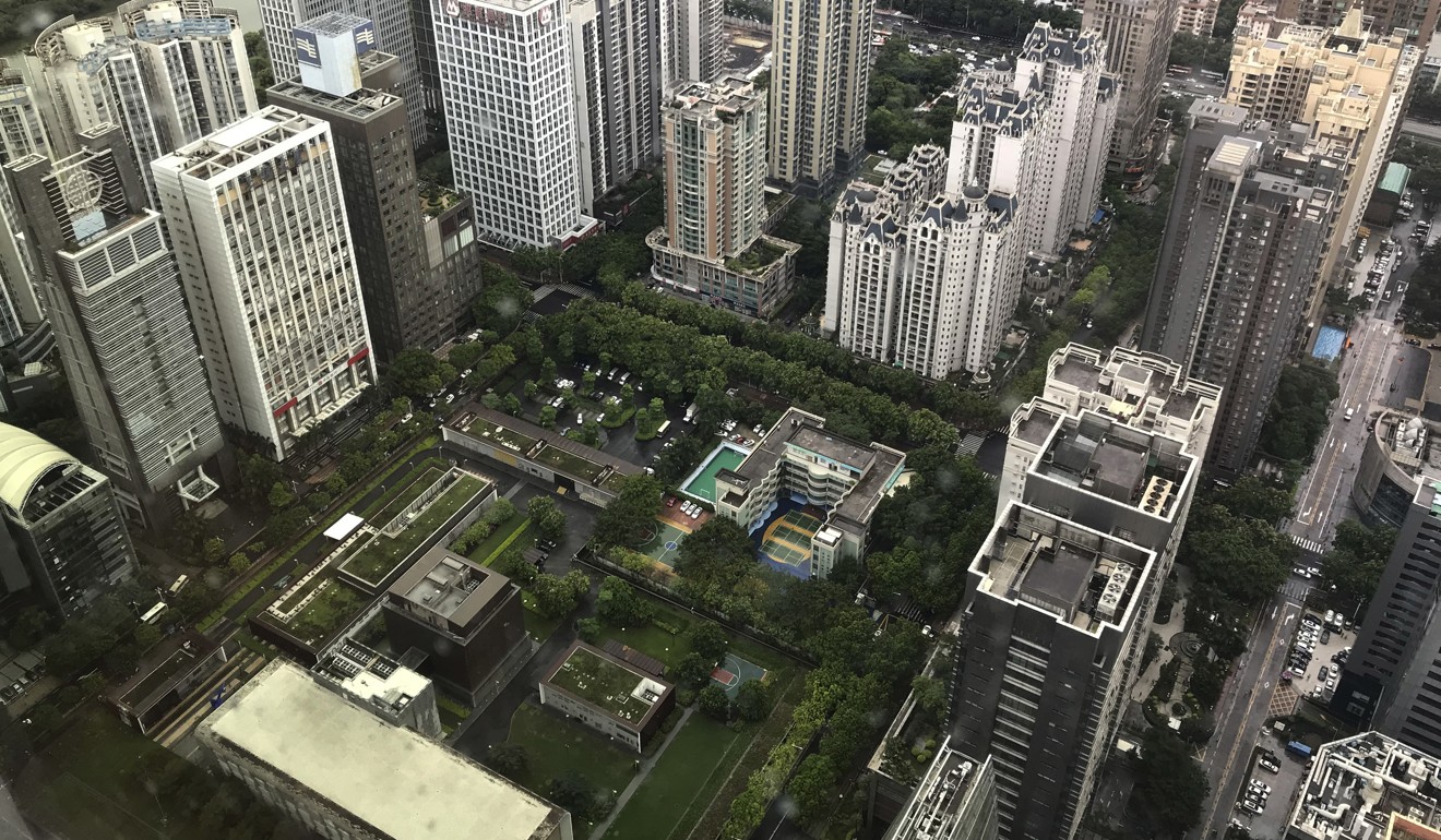 US consulate buildings, centre bottom, are surrounded by high-rise buildings in Guangzhou in China, on June 7. Photo: Color China Photo via AP
