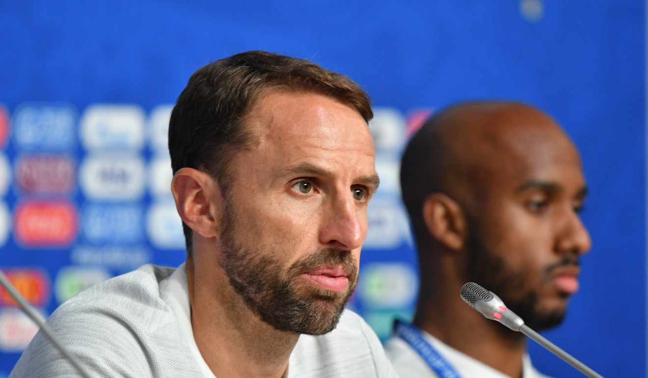 England coach Gareth Southgate and midfielder Fabian Delph hold a press conference at the St Petersburg Stadium. Photo: AFP