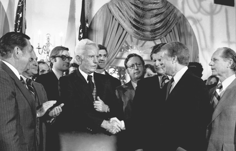 US president Jimmy Carter (second from right) signed the Airline Deregulation Act of 1978. Photo: AP