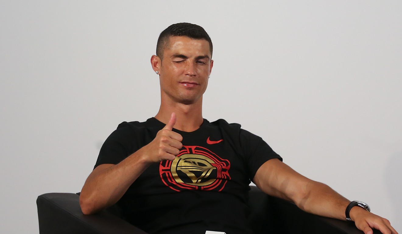 Ronaldo poses for the cameras. Photo: Xinhua