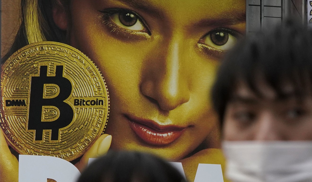 An advertisement for bitcoin in Tokyo. Japan requires all crypto-exchanges to register with the Financial Services Agency. Photo: AP