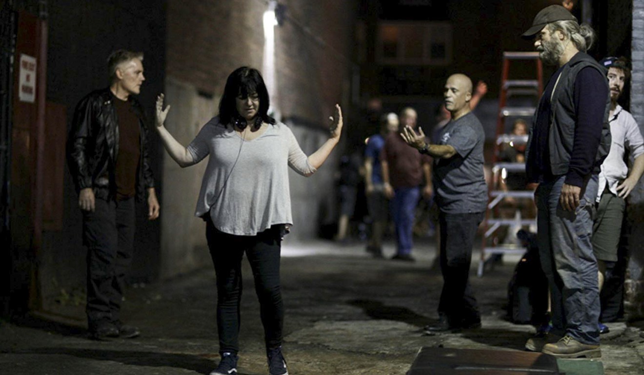 Phoenix (second right) and Lynne (second left) on the set of You Were Never Really Here. Photo: Amazon Studios