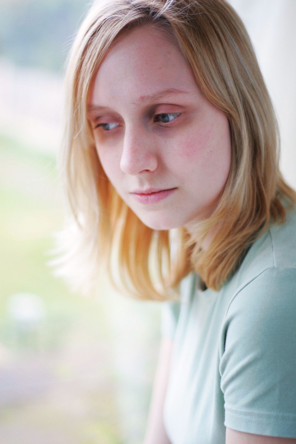 A young woman suffering from ME. Photo: Alamy