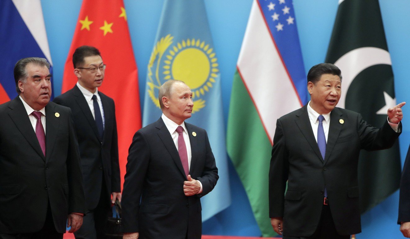 Chinese President Xi Jinping with Russian President Vladimir Putin (second from right) and the leader of Tajikistan, Emomali Rahmon (left), in Qingdao, China, on June 10. Xi has called on Chinese diplomats to ‘formulate principles and policies of China’s external work in a scientific way.’ Photo: Kremlin via Reuters