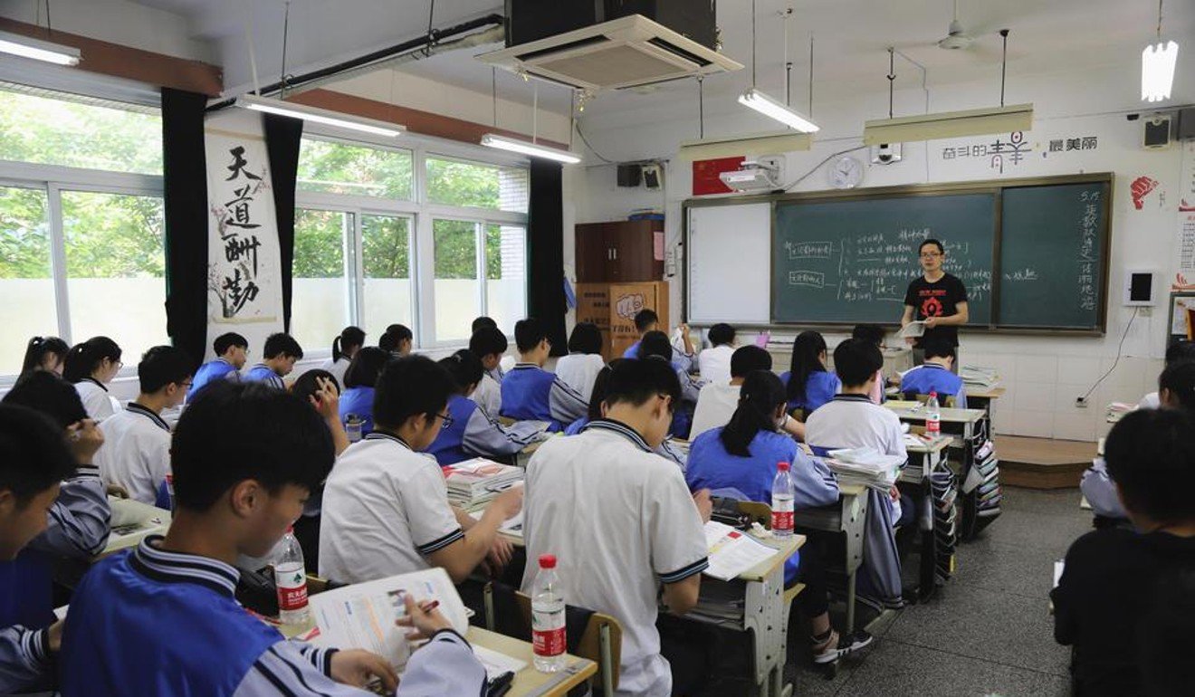 A middle school in Hangzhou installed cameras that can monitor pupils' facial expressions and attentiveness in class. Photo: Sina