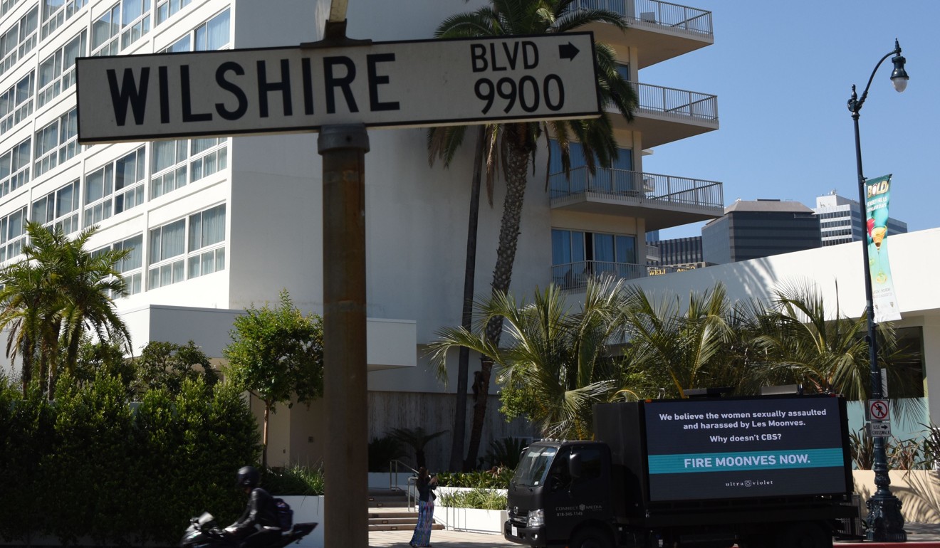 Protesters park a hoarding truck outside the Beverly Hilton Hotel with the message urging the CBS Television Network to fire its chief executive, Leslie Moonves, after accusations by six women that Moonves had sexually harassed them. Photo: AFP