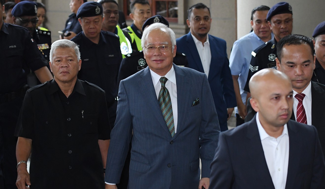 Malaysia’s former prime minister Najib Razak arrives at the court complex in Kuala Lumpur. Photo: AFP