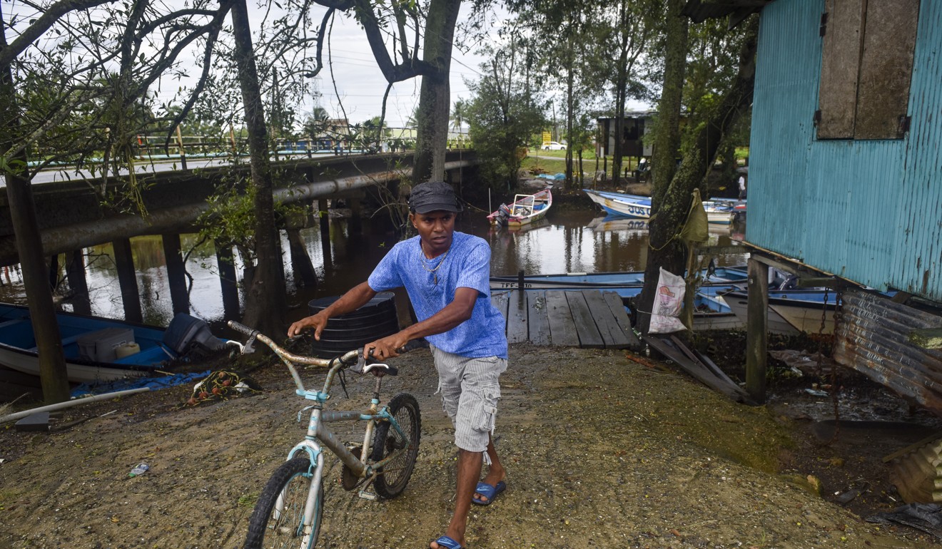 Jimmy Lalla, 36, was with two others when Venezuelan pirates fast approached their fishing boat, forced two of the men off their boat and into the water, and kidnapped the boat's captain on the waters between Venezuela and Trinidad. Photo: Washington Post photo by Jahi Chikwendiu