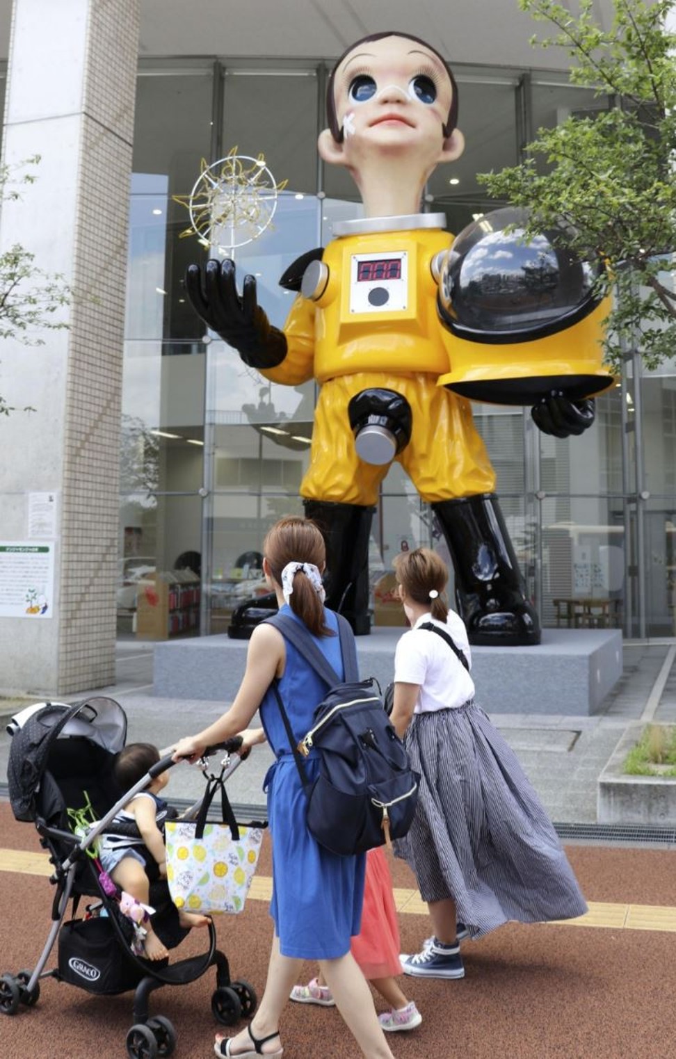 The 6.2-metre statue called Sun Child was made by contemporary artist Kenji Yanobe to express his wish for a world free from nuclear disasters. Photo: Kyodo