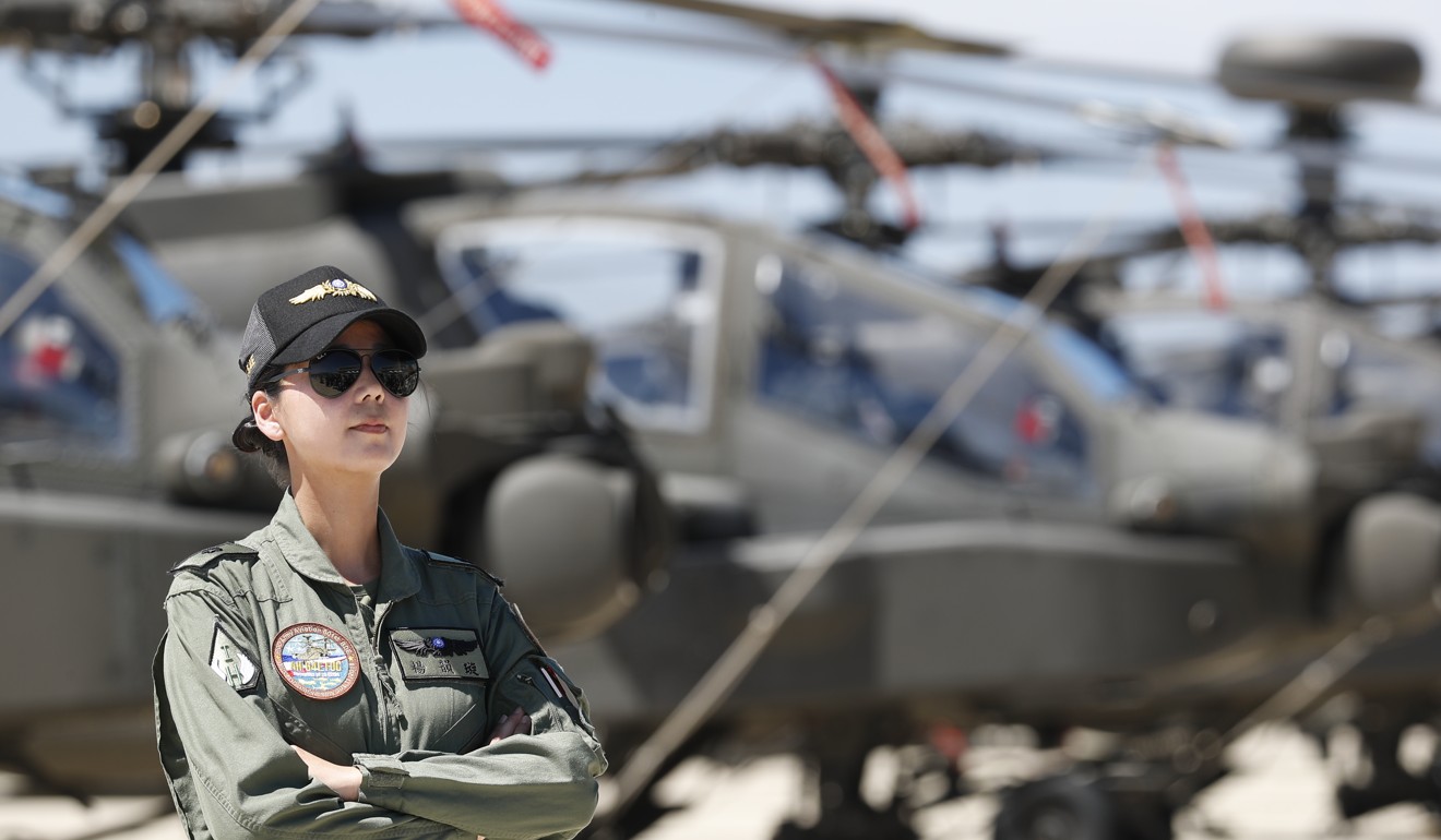 Asia’s first AH-64E Apache attack helicopter female pilot Major Yun Hsuan Yang in Taoyuan City, Taiwan. Photo: EPA
