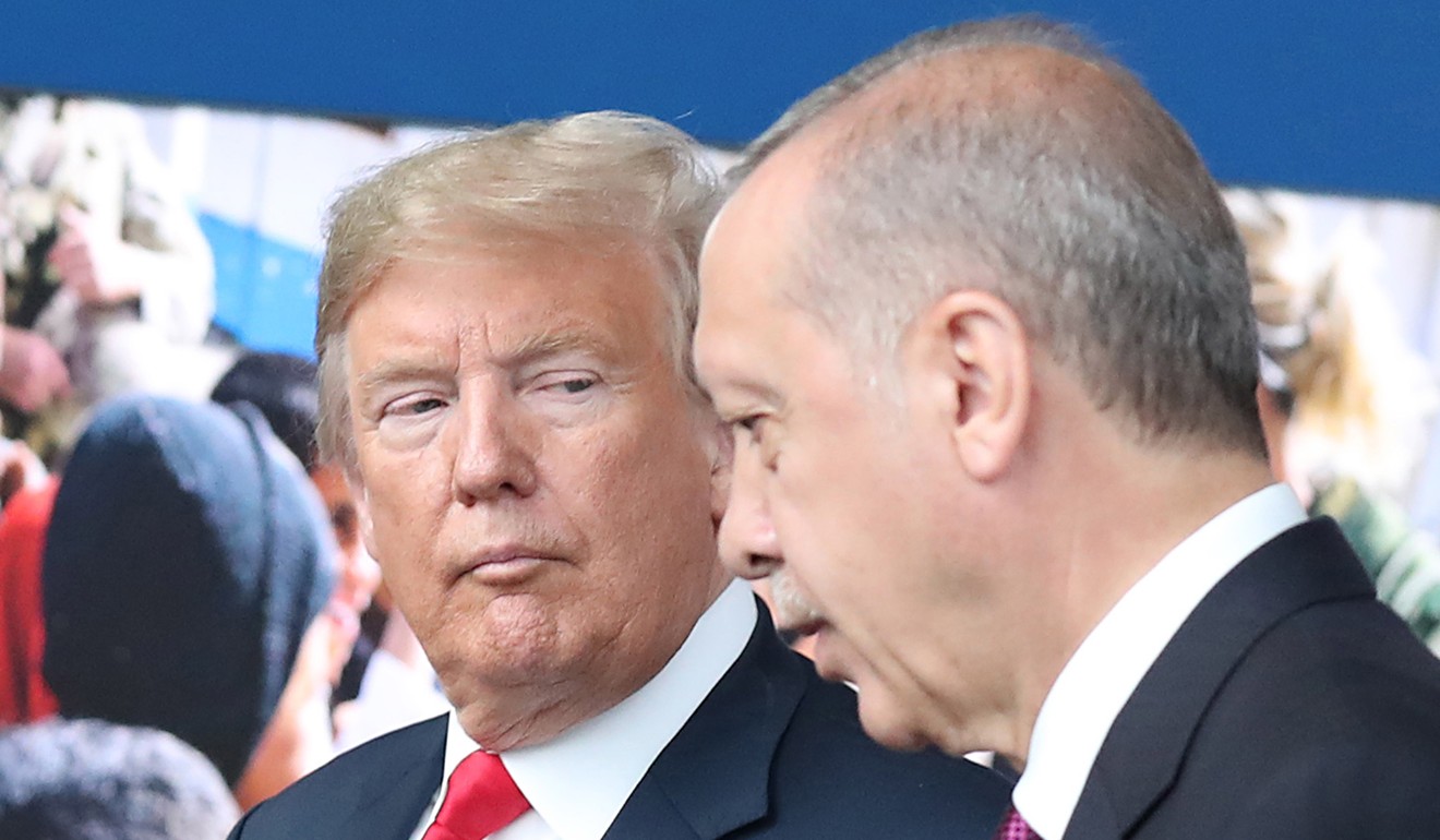 US President Donald Trump with Turkey's President Recep Tayyip Erdogan at Nato’s headquarters in Brussels on July 11. The lira began its plunge against the US dollar after Trump announced on August 10 that the US would increase tariffs imposed on Turkey over its imprisonment of an American pastor. Photo: EPA-EFE