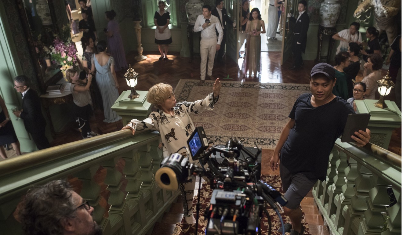 Chu on the set of Crazy Rich Asians.