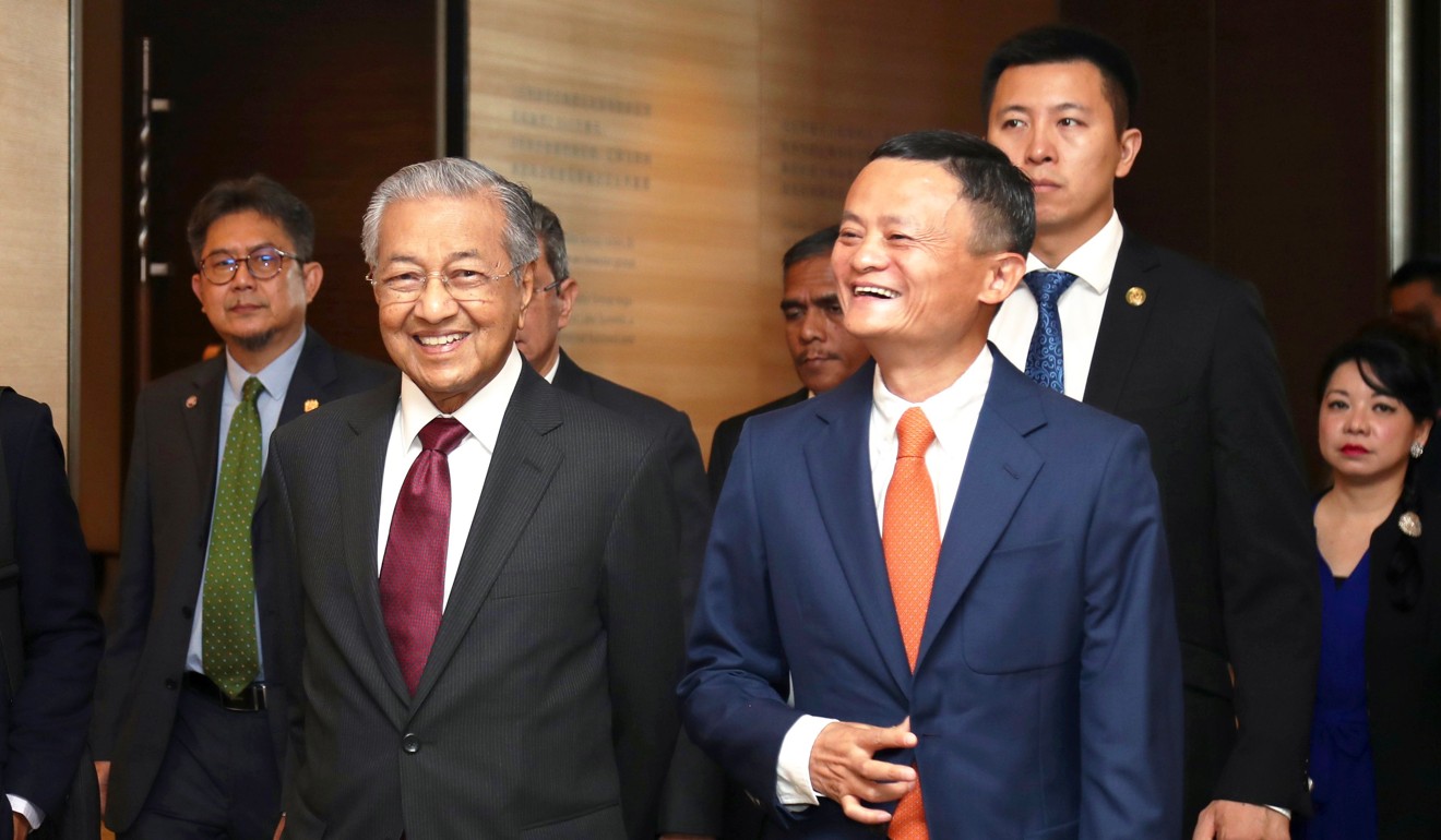 Malaysian Prime Minister Mahathir Mohamad tours the Alibaba Corporate headquarters with Alibaba chairman Jack Ma in Hangzhou. Photo: Agence France-Presse