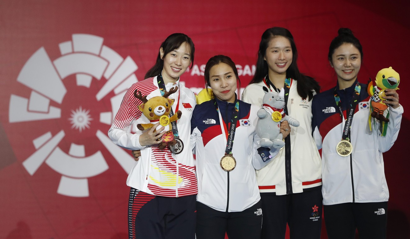Vivian Kong (second from right) at the Asian Games medal ceremony for the women’s épée individual competition with silver medallist Sun Yiwen of China (left), gold medallist Kang Youngmi of South Korea (second from left) and fellow bronze medallist Choi Injeong of South Korea (right). Photo: Reuters