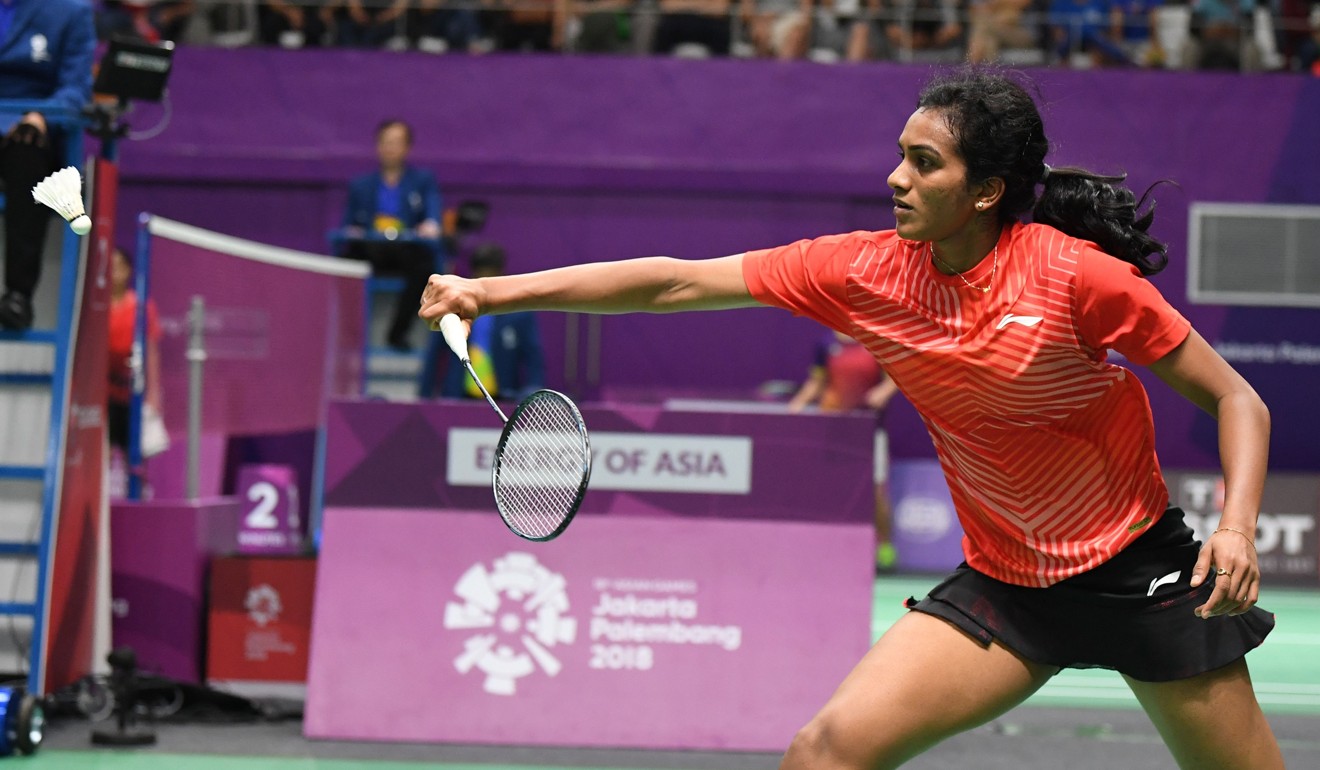 India’s PV Sindhu hits a shot at the 2018 Asian Games. Photo: AFP
