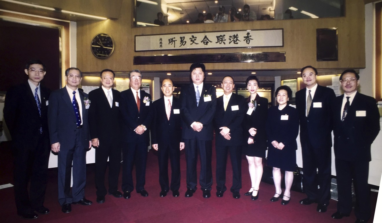 Ida Tang Fung-kwan, (8th from left), the new chairwoman of CEC International and 759 Store, at the listing ceremony of CEC on Hong Kong stock exchange in 1999. Coils Lam (6th from left) was the founding chairman of the company. Photo: Handout