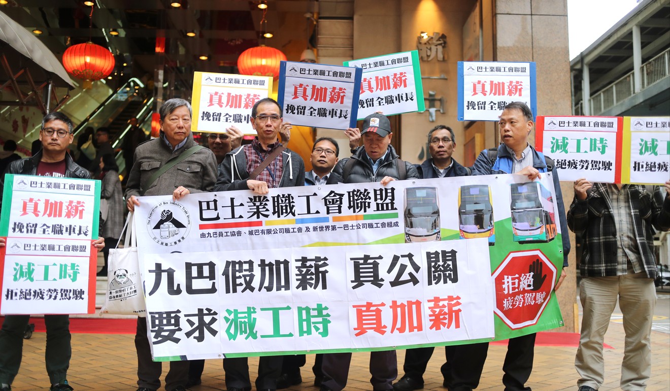 Members of the Federation of Bus Industry Trade Unions demonstrate for higher salaries and reduced working hours, in Admiralty on February 23. The February 10 double-decker bus accident in Tai Po, which killed 19 and injured 65 others, drew increased attention to bus driver fatigue. Photo: Winson Wong