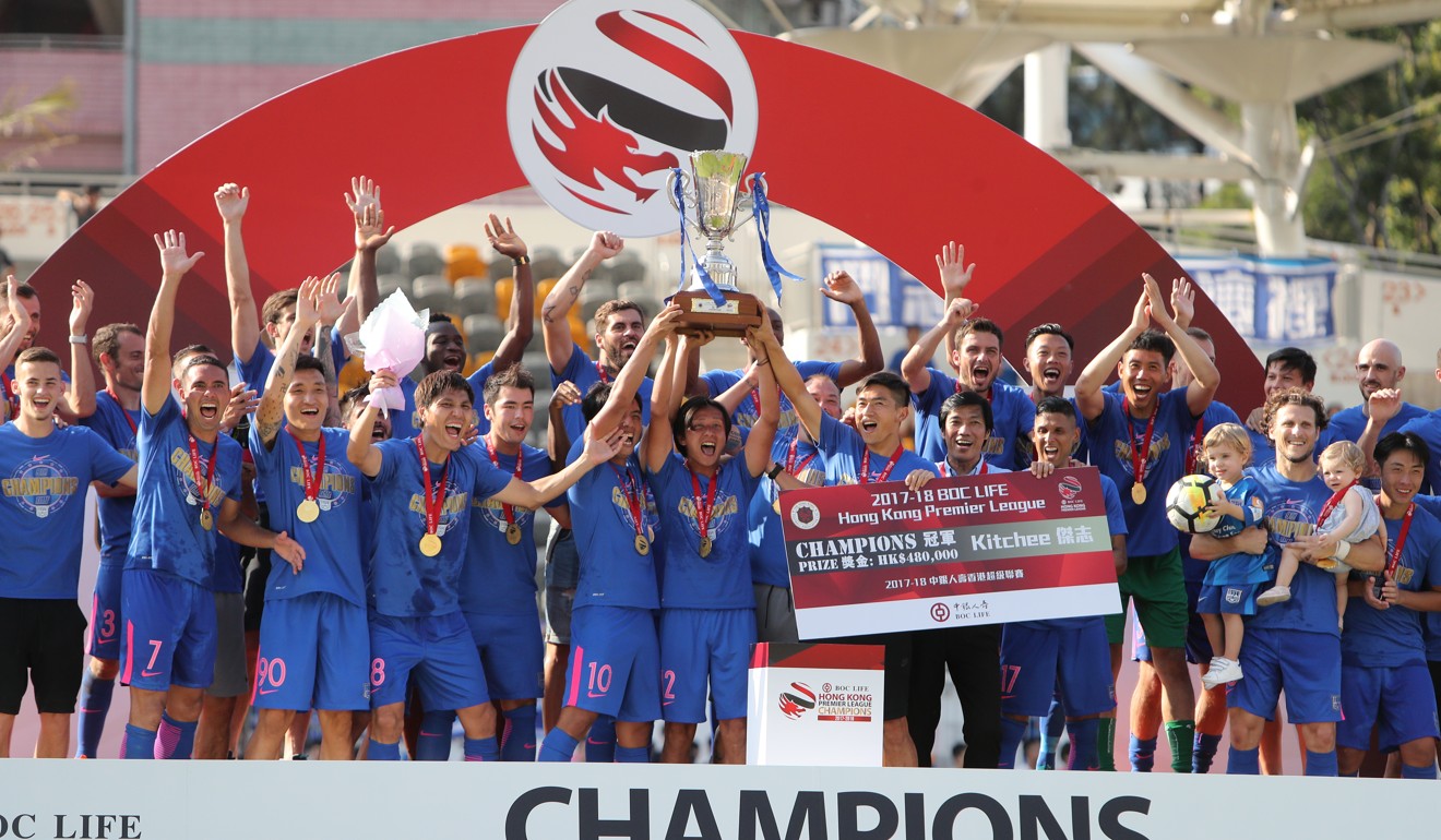 Kitchee players and coaching staff celebrate winning the Hong Kong Premier League. Photo: Winson Wong