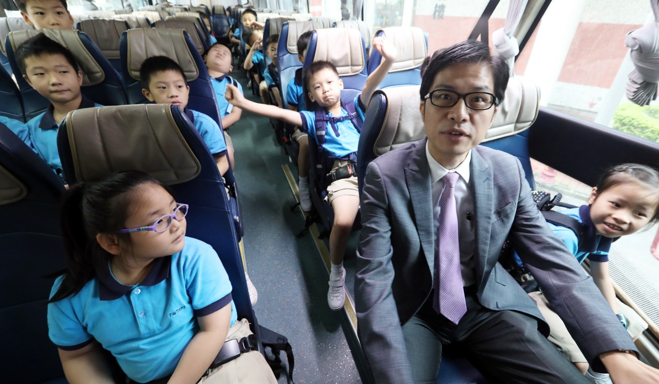 Principal Chow Kim-ho with some of his pupils. Photo: Dickson Lee
