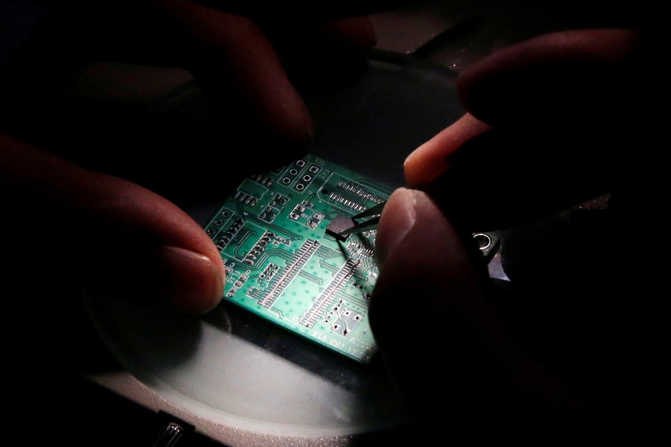 Mainland Chinese chip makers are offering new hires perks like discounted property and school subsidies. Photo: Reuters