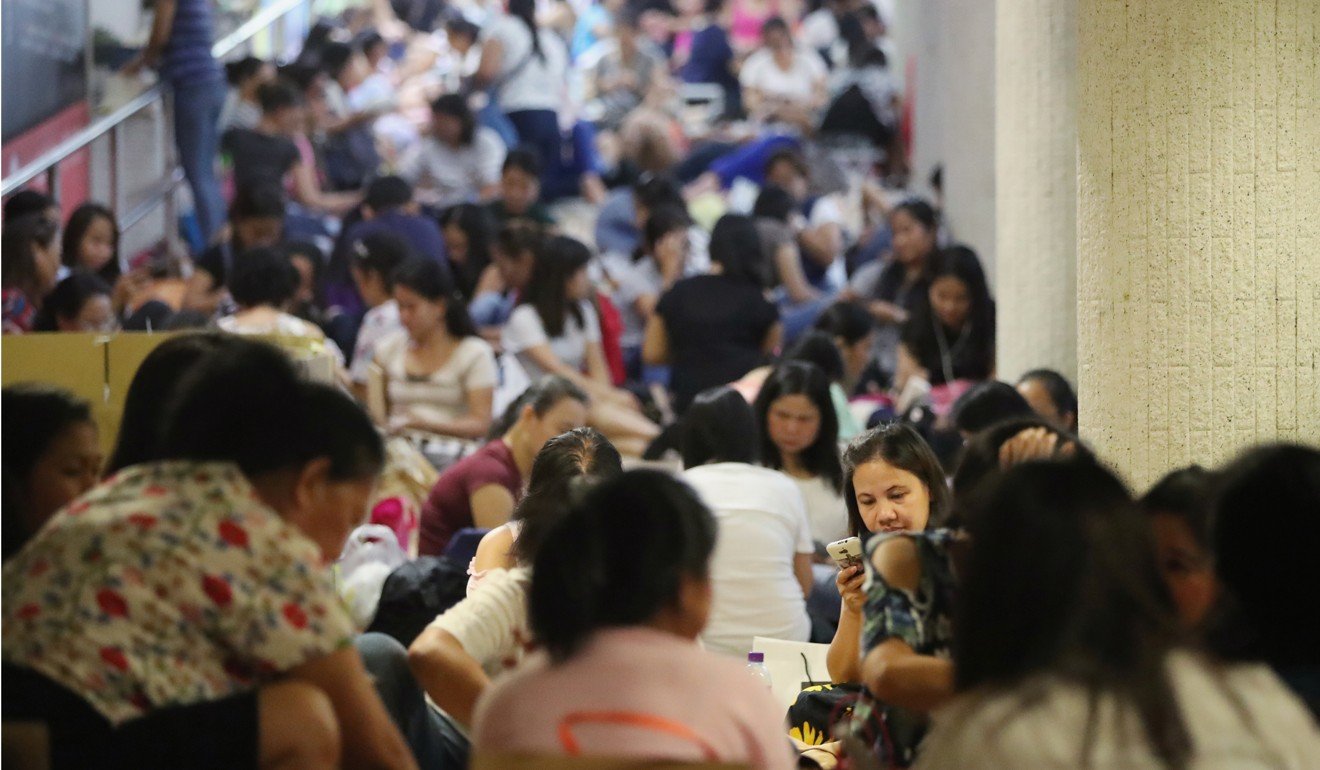 Domestic workers gather in Central on a public holiday in June. The Hong Kong government published an action plan in March to tackle human trafficking and enhance protection for foreign domestic workers, but the plan misstates important aspects of Hong Kong’s trafficking challenge. Photo: Edward Wong