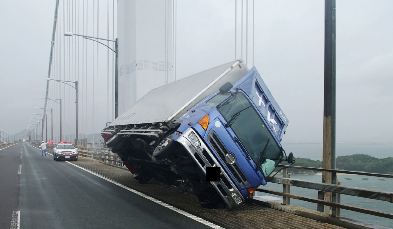 A truck was blown over by Typhoon Jebi’s winds on Tuesday, Photo: AFP